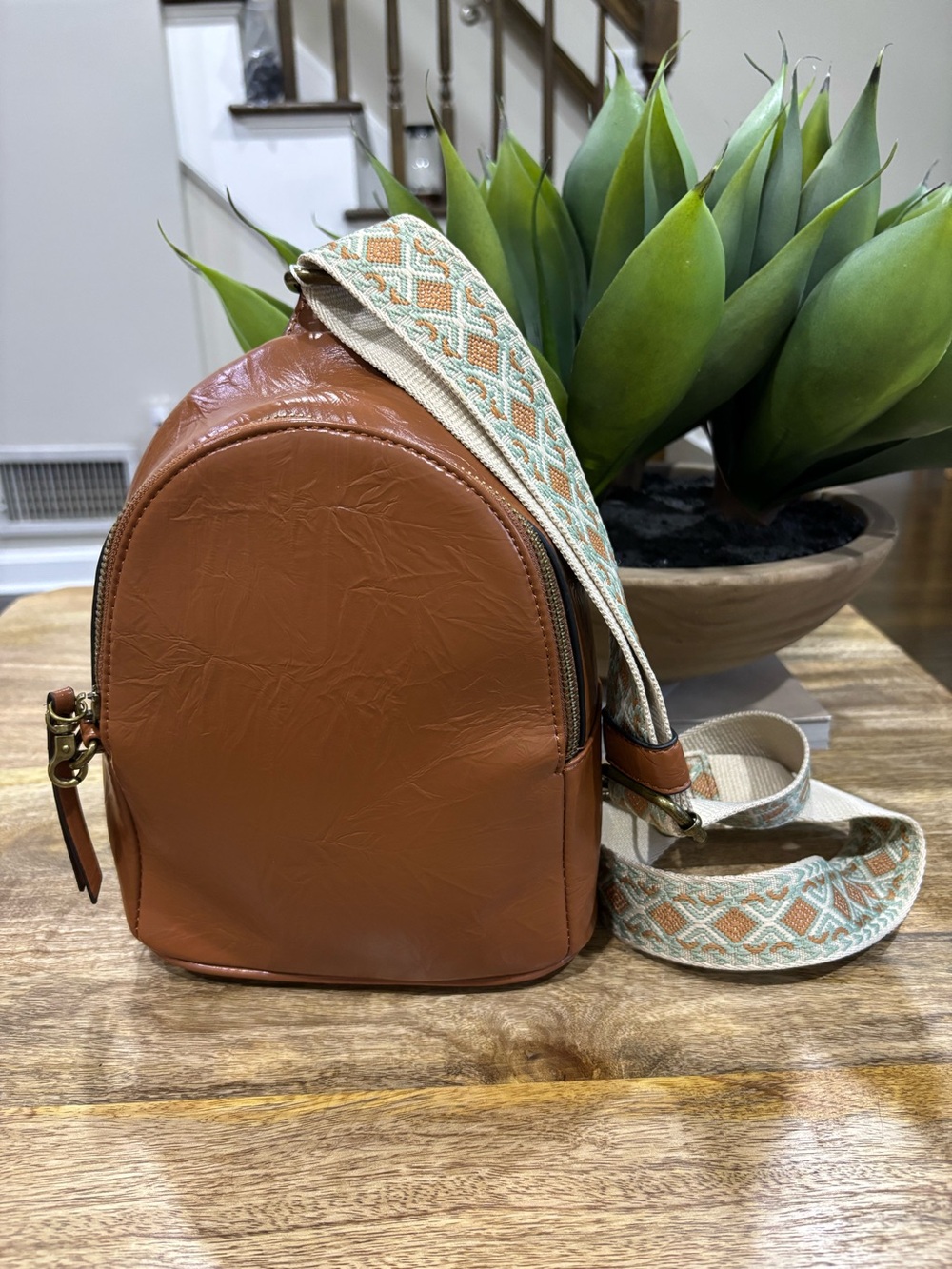 Crossbody Backpack with Patterned Strap